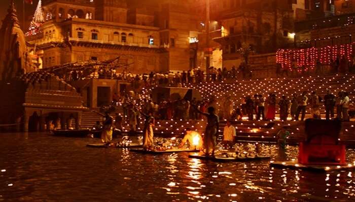 Worshippers gather on the ghats of river Ganga in Varanasi to celebrate the Ganga Mahotsav
