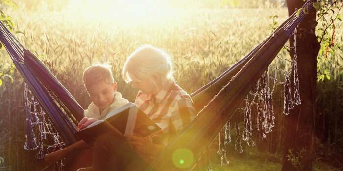 A grandmother narrating her adventures to her grandson