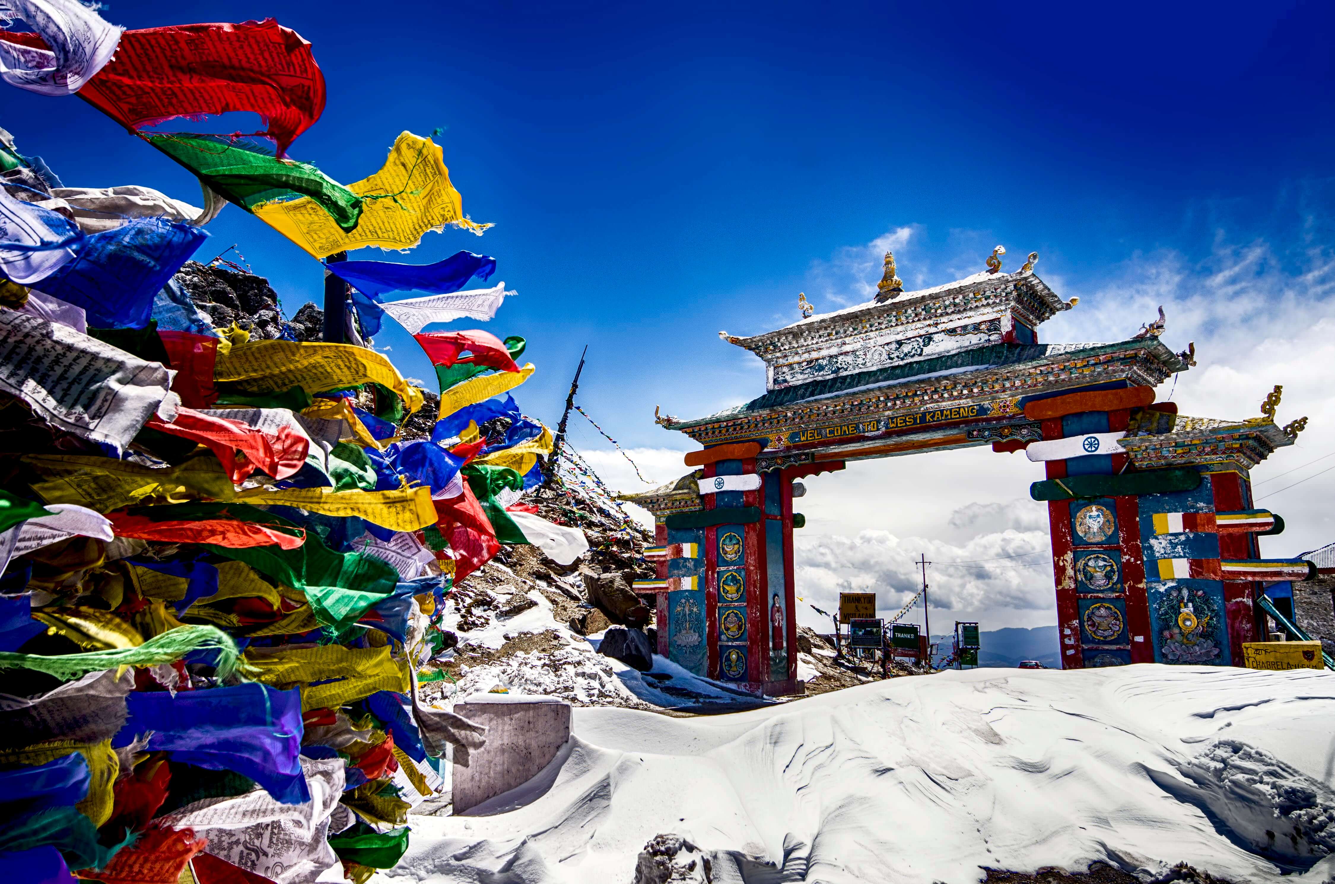prayer flags near Tawang gate which is covered by snow