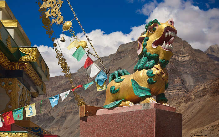 Stone sculpture of "Shishi" or Lion of Buddha in front ofT abo in Spiti