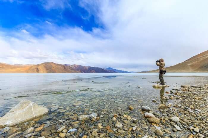 Photographer taking a picture of Pangong lake