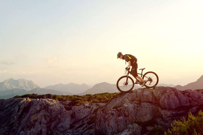 riding a smaller mountain bike