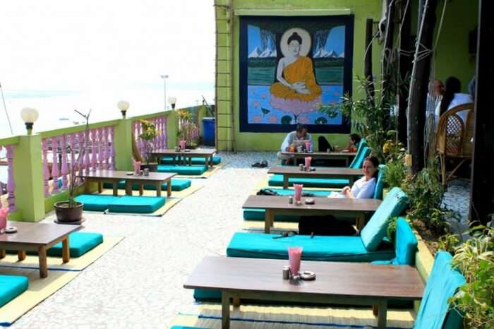 Visitors enjoying food and view in Lotus Lounge