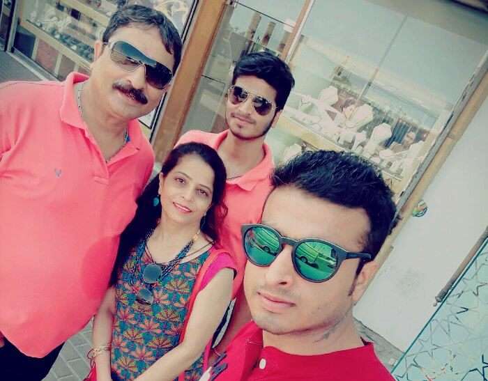 abhinav and his family outside a gold souk in Dubai