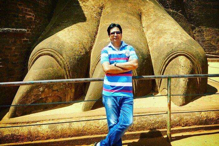 me standing before the stone lion rock atop sigiriya rock fortress