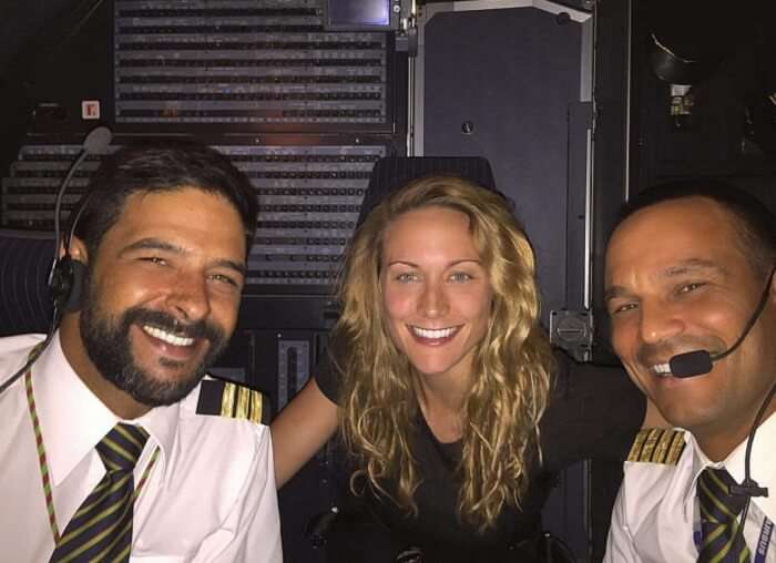 Cassie taking a selfie with pilots