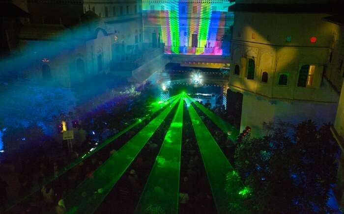 Colorful laser lights during Magnetic Fields Festival in Jaipur - one of the best places to visit in Rajasthan in winter