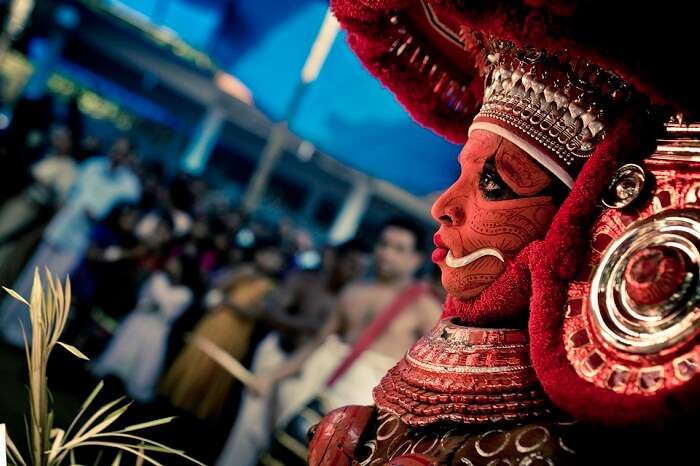 A performer at the grand celebrations of Perumthitta Tharavad festival in Kerala