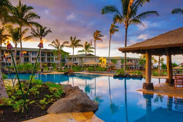 The Westin Resort pool and cabana at sunset in Princeville on the tropical island of Kauai in Hawaii