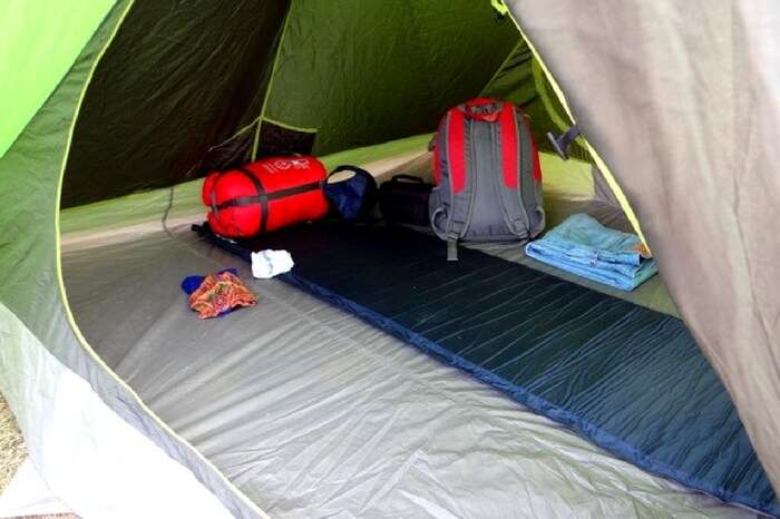 A well laid out tent during snow camping at Prashar Lake