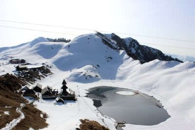 An aerial view of Prashar Lake after a fresh snowfall