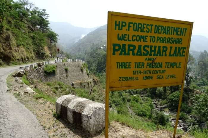 A signboard indicating your arrival at Prashar Lake