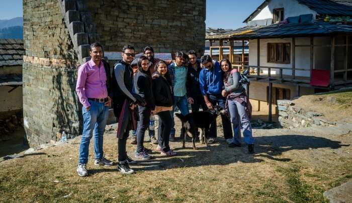 posing near rishi maharaja temple