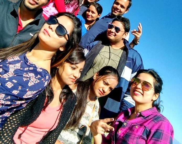 Group of travelers click a selfie in Khajjiar