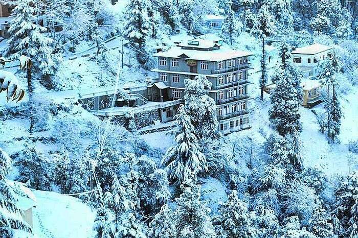 A snap of the snow-covered Hotel Ekant in Chail