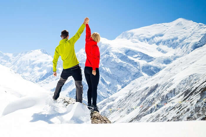 A couple after completing a trek in Annapurna Himalayas during a honeymoon in Nepal