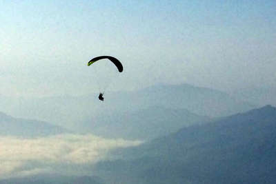 my friend engaging in paragliding