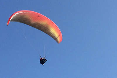 the members of the group engaging in paragliding