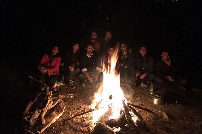 Friends enjoying the bonfire together