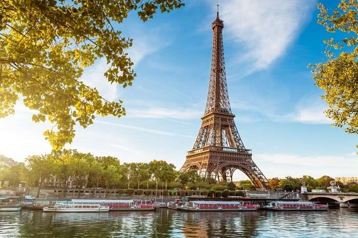 A shot of the Eiffel Tower taken from the other side of the water body in France