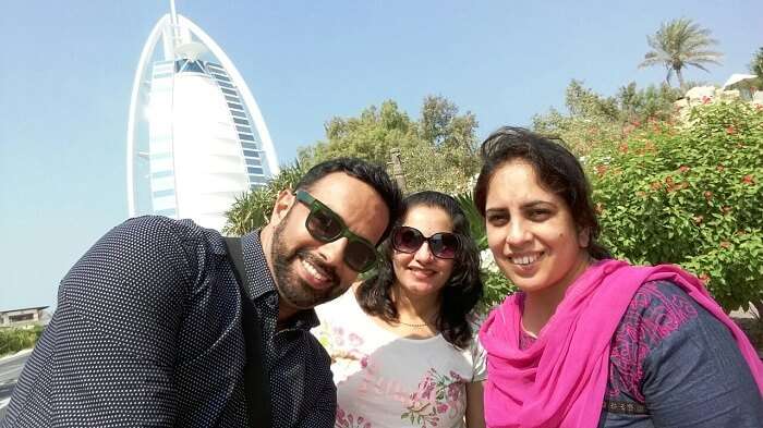 Family clicking selfie in front of Burj-al-Arab