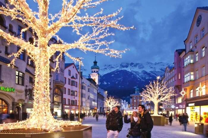 Visitors looking at a decorations on Christmas eve in Innsbruck