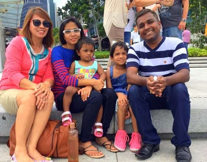 Govind and his family doing sightseeing in Singapore