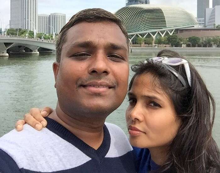 Govind takes a selfie with his wife in Singapore