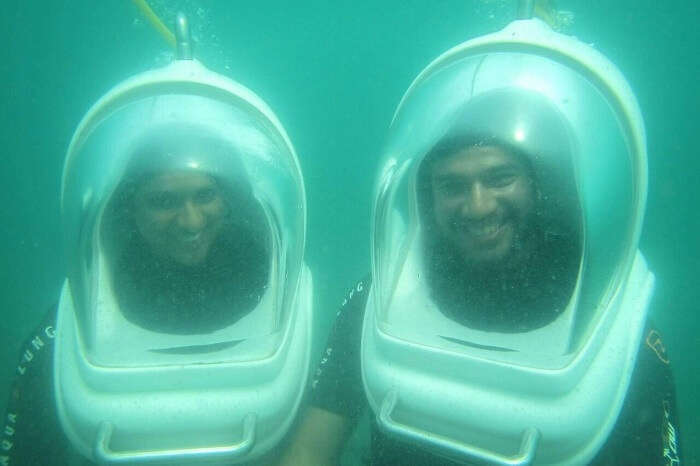 couple enjoying underwater seawalking