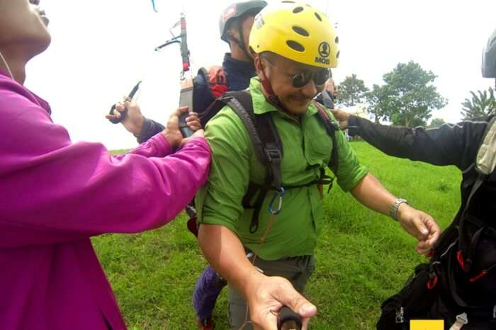 Paraglider getting ready for paragliding