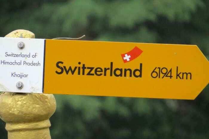 Signboard showing Khajjiar as Switzerland of Himachal Pradesh