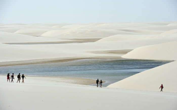 People walking around Lencois Maranhenses National Park