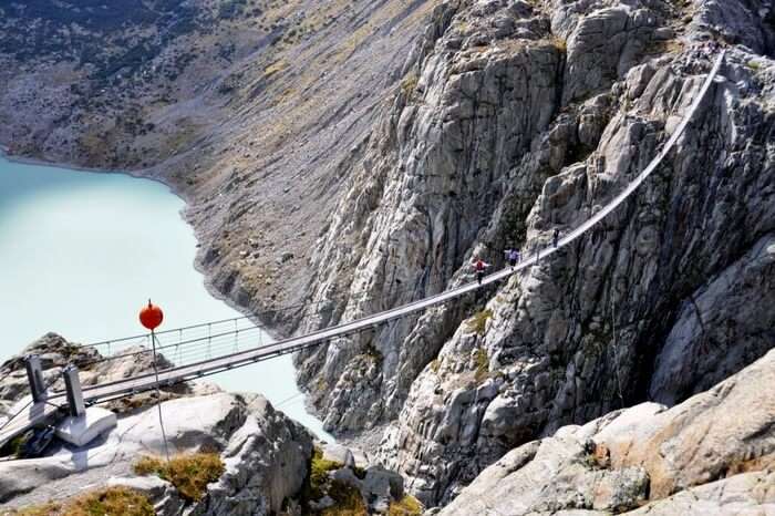 An aerial view of Trift Bridge in Switzerland