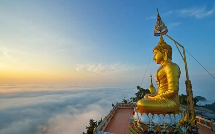 Tiger Cave Temple surrounded by clouds - a must-visit on your honeymoon in Krabi 