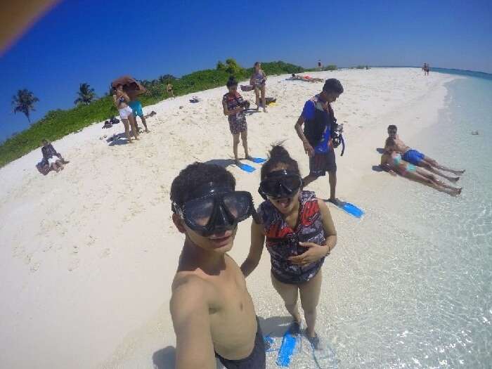 Nisarg and his wife on a beach in Maldives