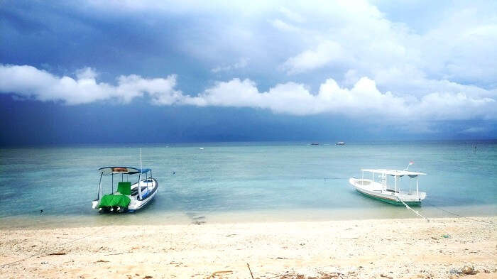 Speedboats on the white sandy beach