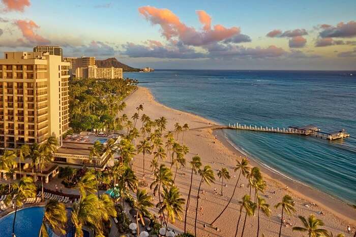 A sunset shot of the Ali-i Tower at the Hilton Hawaiian Village Waikiki Beach Resort in Honolulu