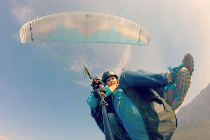 taking selfies while paragliding over Bir and Billing
