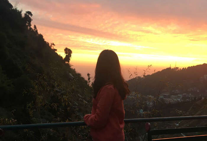 tejal watching sunset from shiva cafe