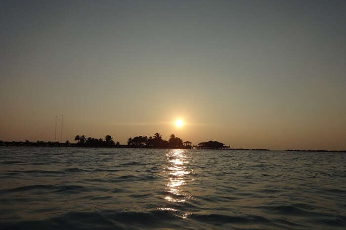 sunset at a beach in Maldives