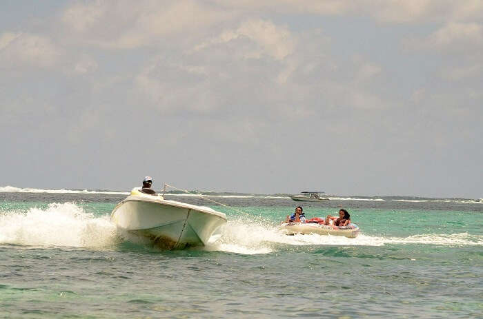 Couple enjoying tube ride in Mauritius