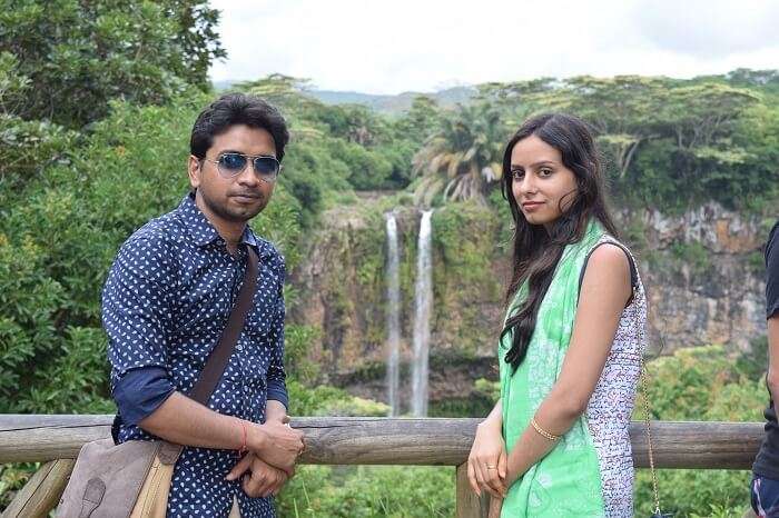 Couple enjoying at Chamarel waterfalls