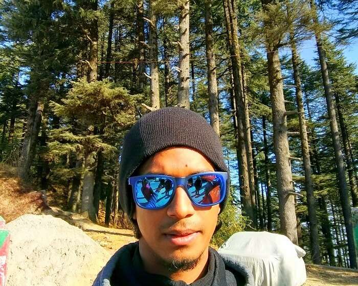 Rishabh takes a selfie in the woods