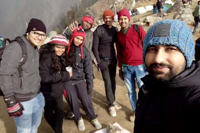 Friends trekking and posing together