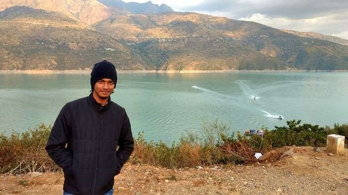 Rishabh poses for a picture at the Tehri lake