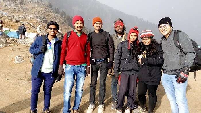 Group of friends trekking on a montain