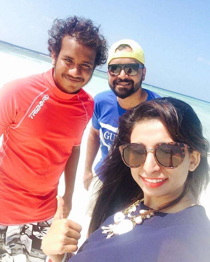 Mubashir and his wife with their scuba diving teacher in maldives