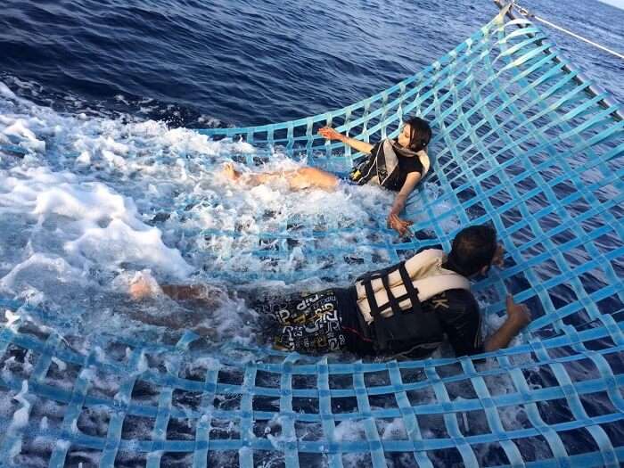 Mubashir and his wife enjoy activities on the nets on the sunset cruise