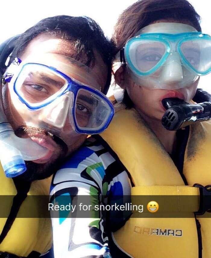 Mubashir and his wife in their snorkeling gear