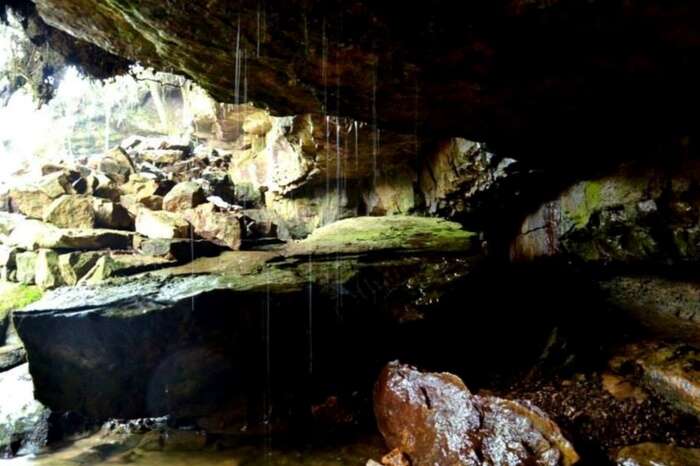 Water dripping from rock in a cave in Garden of Caves in Meghalaya